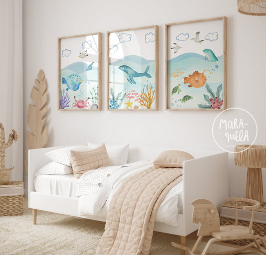 láminas infantiles con animales marinos en una habitación infantil